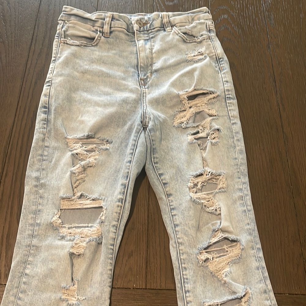 AA light wash distressed skinny stretch jeans